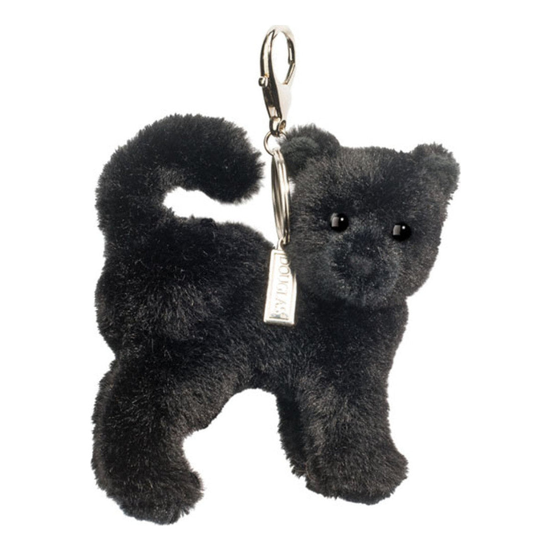 Das ist eine schwarze Katze von Douglas Cuddle Toys. Kleine stehende Katze mit kurzem, dichtem, leicht glänzendem schwarzem Fell. Schnauze, Ohreninnenseiten, Bauch und Pfoten sind ebenso schwarz und kurz behaart. Die Augen sind schwarz und rund, die Nase klein, schwarz und dreieckig. Keine Abzeichen oder Flecken. Natürliche Stellung auf vier Pfoten, der Schwanz nach oben gebogen. Keine Kleidung, nichts in den Pfoten. Der Ausdruck wirkt neugierig und wach.